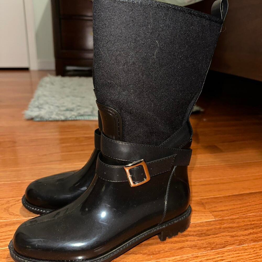 Black tall boots with buckle